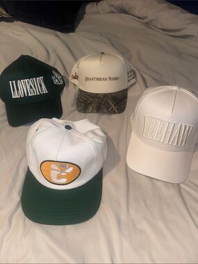 4 Pack of hats. Lightly worn. Available for individual purchase